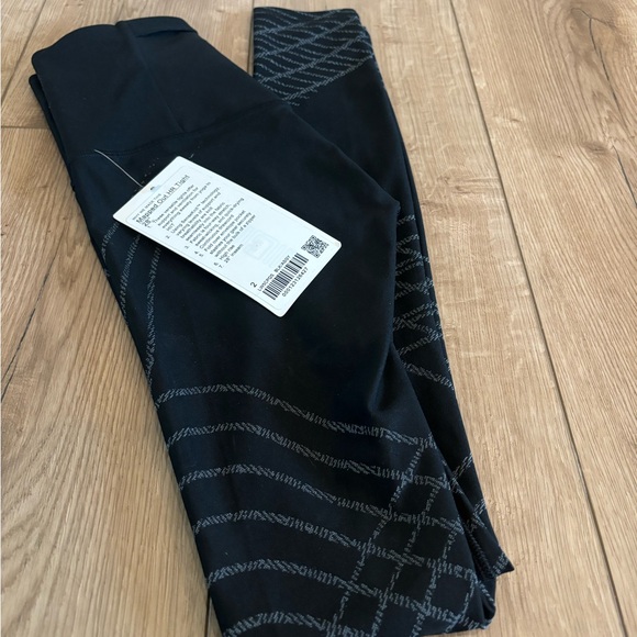 Size 2 Mapped Out Lululemon Tights - 28” - Picture 2 of 3